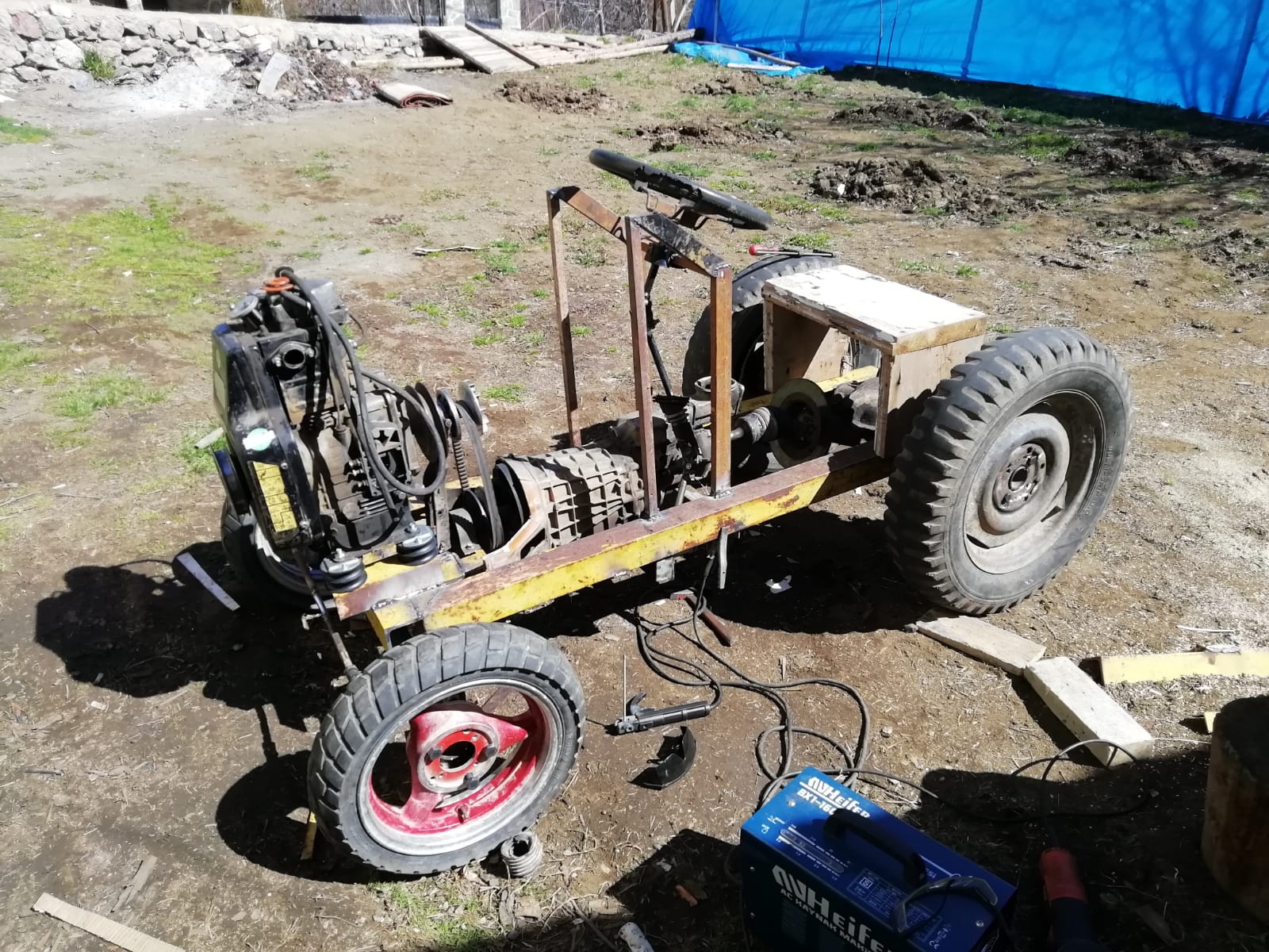 Babası yorulmasın diye traktör yaptı 21