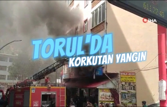 Torul'da 2 katlı mağazada çıkan yangında maddi hasara neden oldu